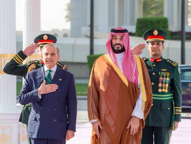 FILE PHOTO: Saudi Crown Prince Mohammed bin Salman and Pakistan Prime Minister Shehbaz Sharif sign a defence agreement in Riyadh