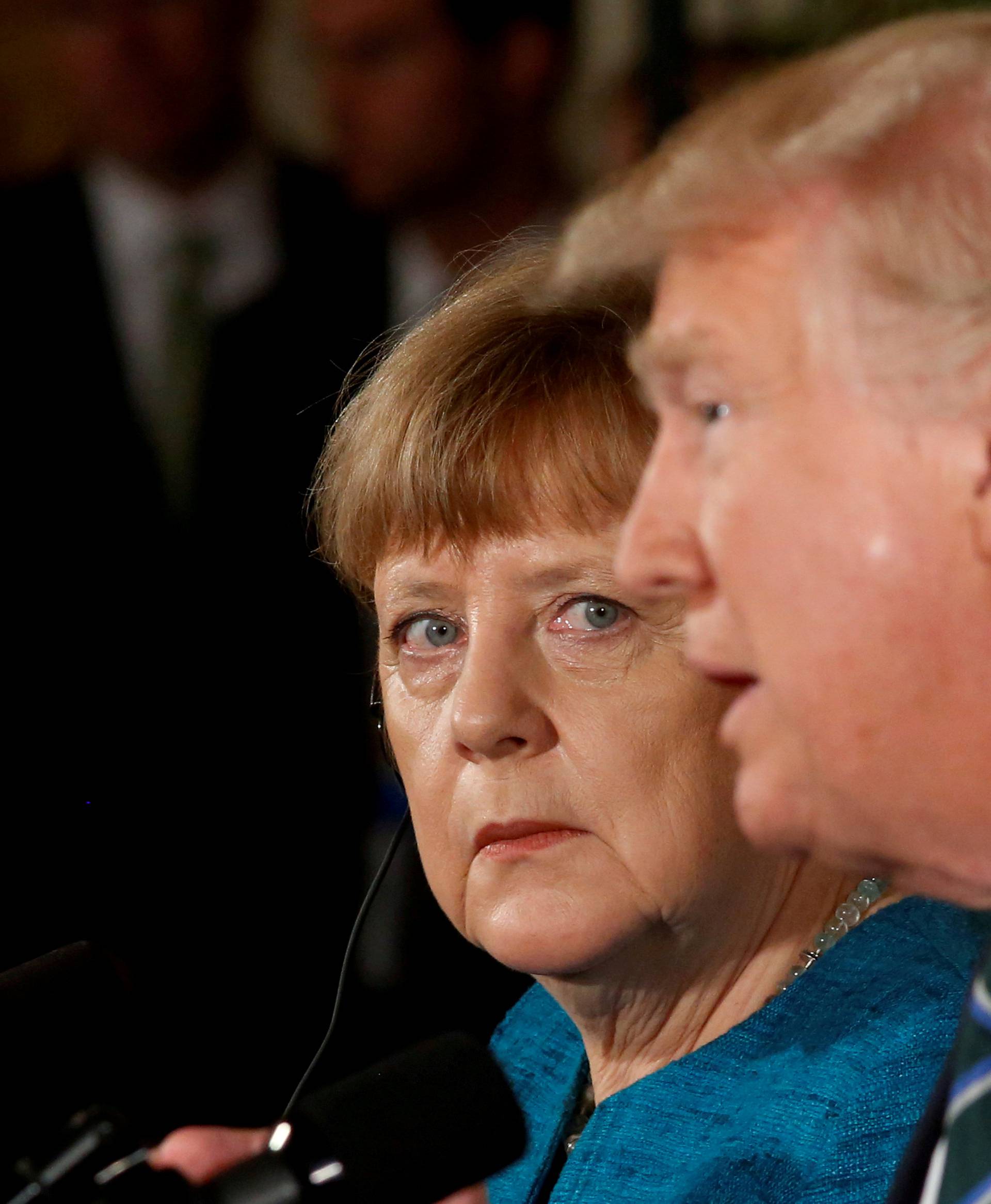 FILE PHOTO: Germany's Chancellor Angela Merkel and U.S. President Donald Trump