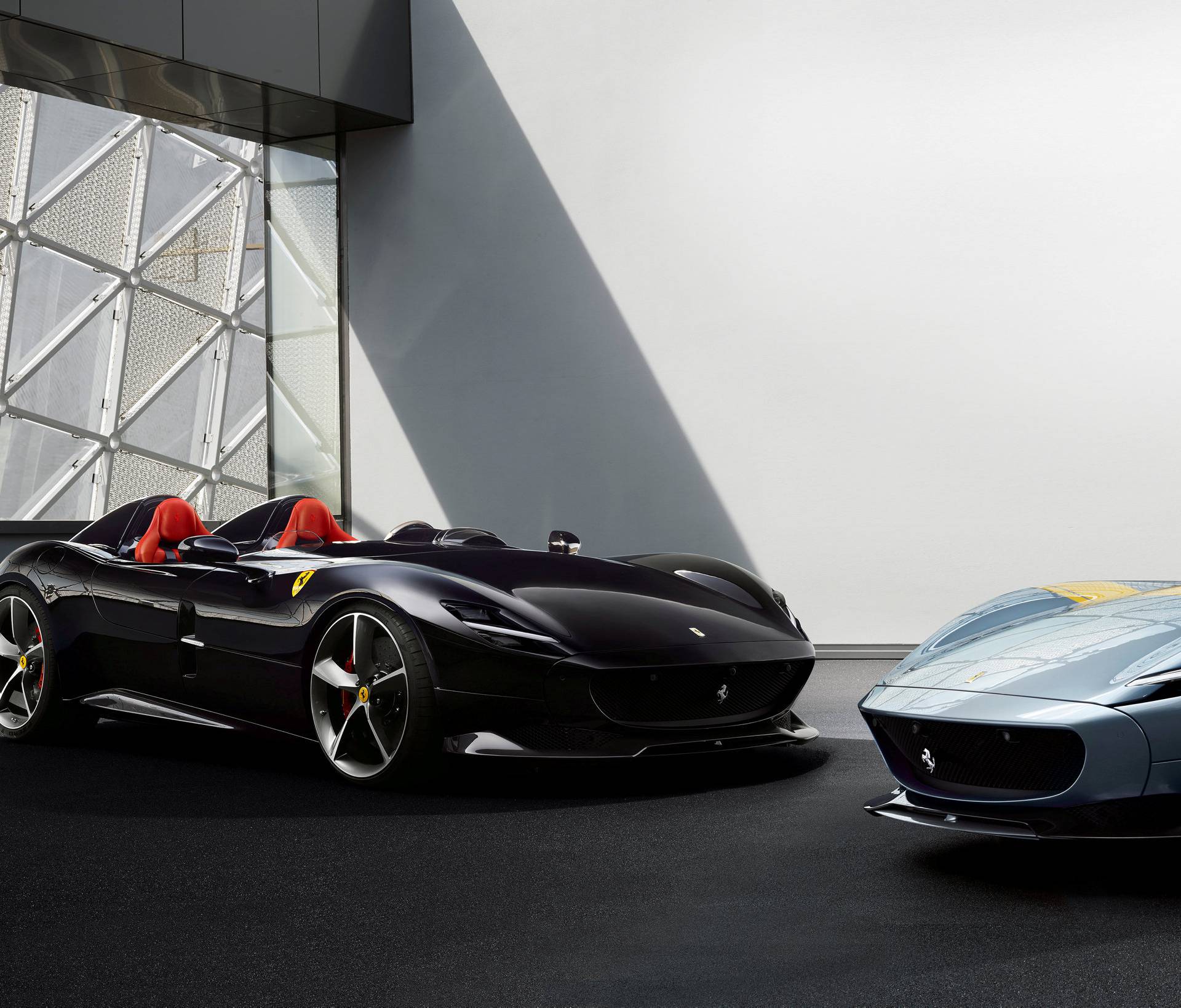 Ferrari's new Monza SP1 and SP2 cars are seen in this picture released by Ferrari press office during a meeting in Maranello