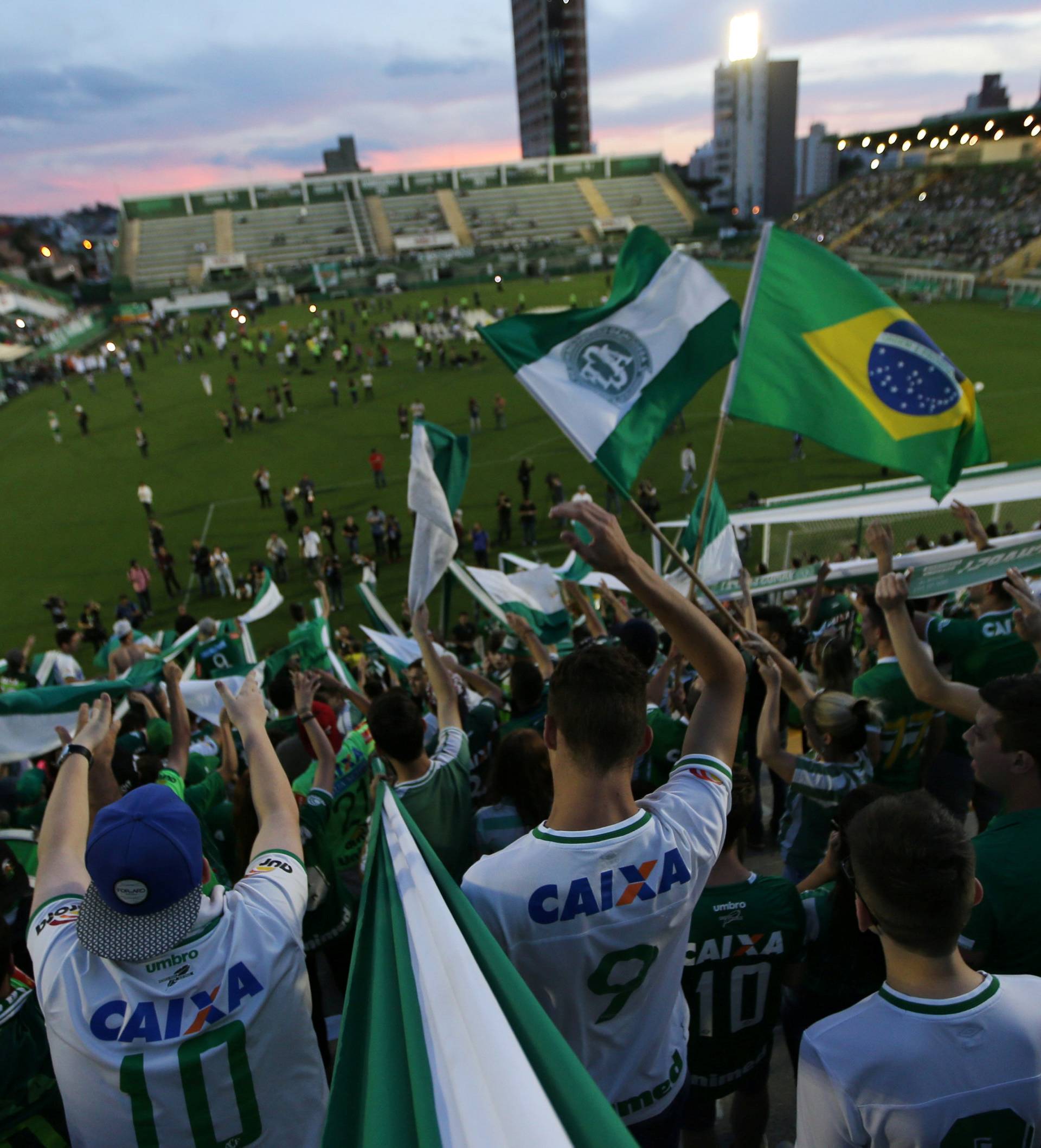 Fans of Chapecoense soccer team pay tribute to Chapecoense's players at the Arena Conda stadium in Chapeco