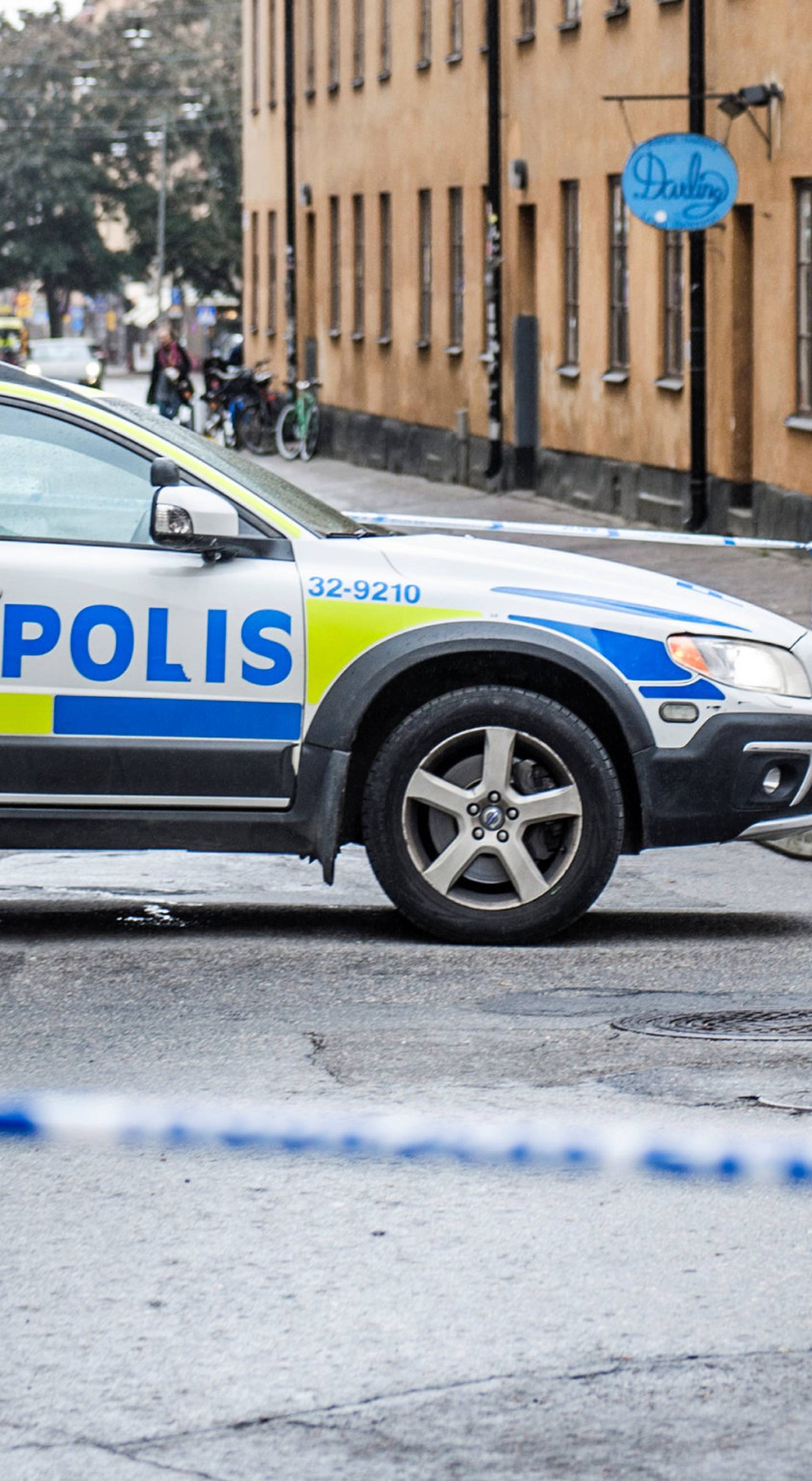 Truck driver is on the run after crashing into taxi, in the Sodermalm district, in Stockholm