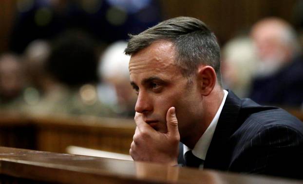 Former Paralympian Oscar Pistorius attends the sentencing for the murder of Reeva Steenkamp at the Pretoria High Court