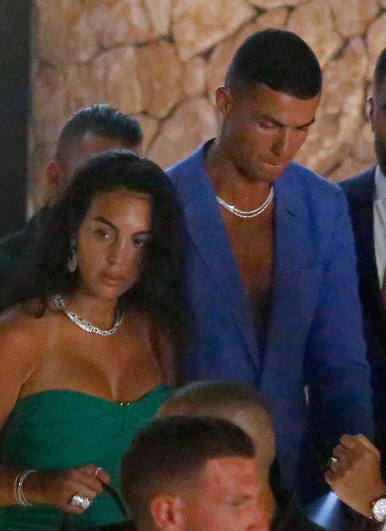 EXCLUSIVE: Cristiano Ronaldo and his wife Georgina Rodriguez are seen dancing, hugging and kissing on a night out with friends