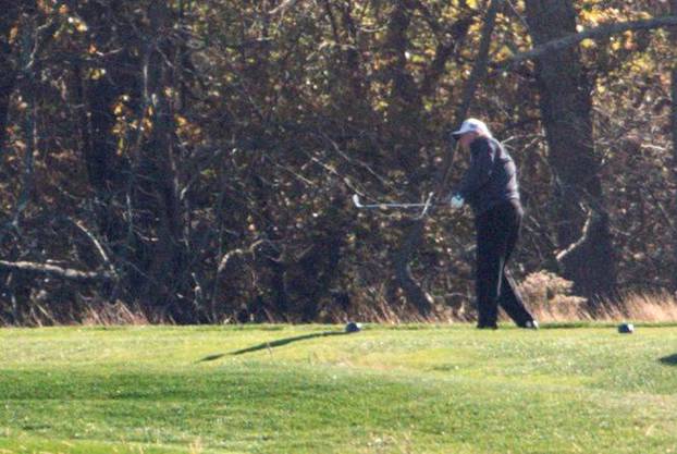 U.S. President Donald Trump plays golf after the 2020 U.S. presidential election was called for Democratic presidential candidate former Vice President Joe Biden at the Trump National Golf Club in Sterling, Virginia