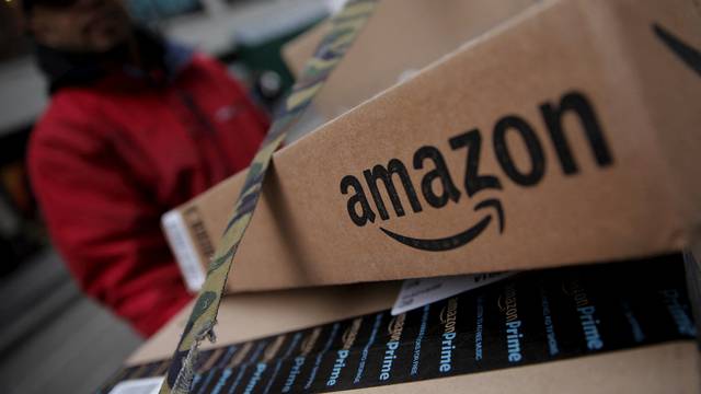 FILE PHOTO: Amazon boxes are seen stacked for delivery in the Manhattan borough of New York City