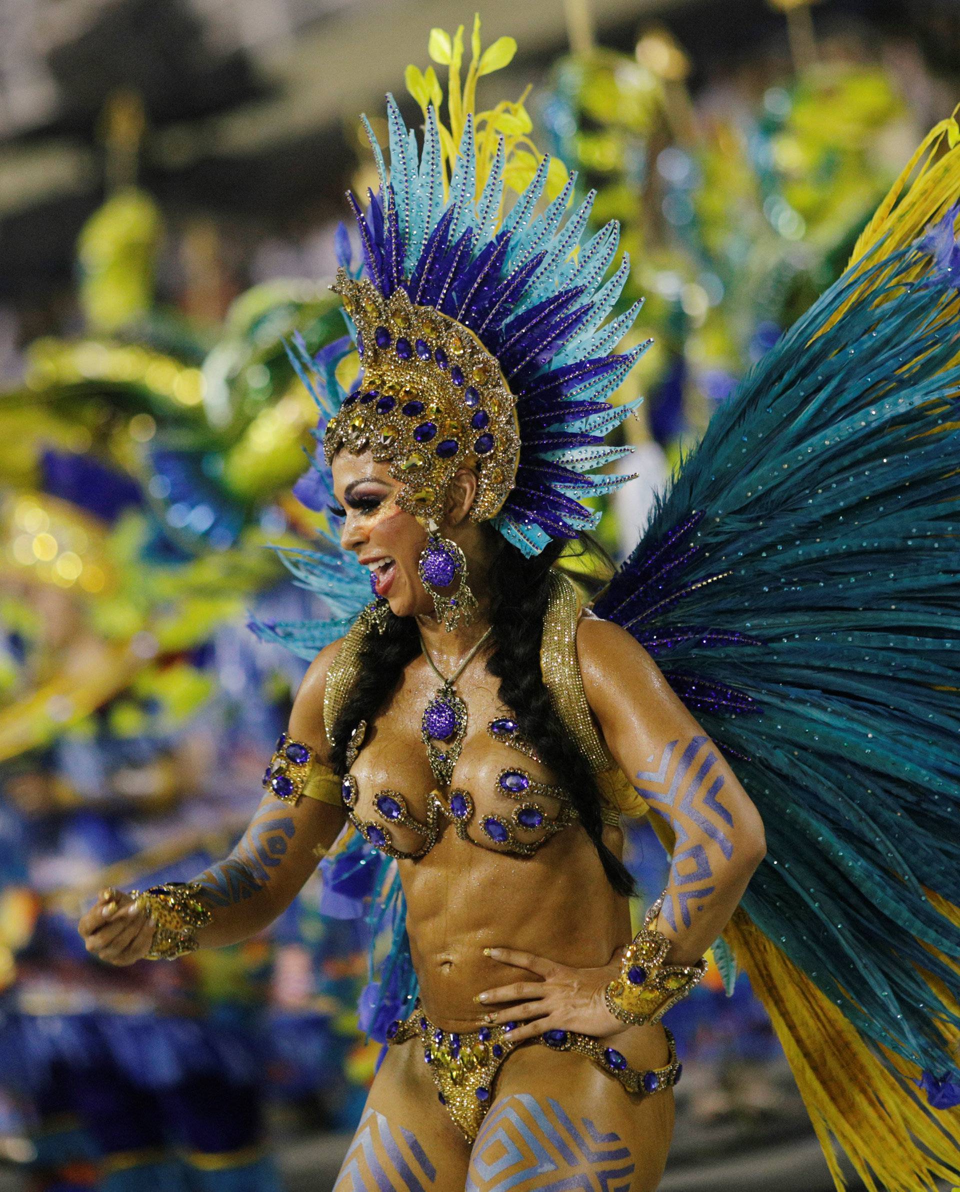 Revellers from Uniao da Ilha Samba school perform during the second night of the Carnival parade at the Sambadrome in Rio de Janeiro