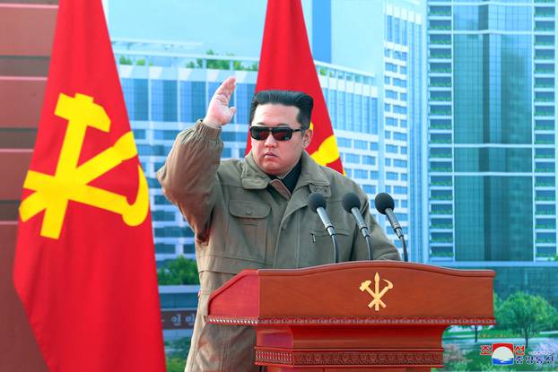 North Korean leader Kim Jong Un delivers a speech at ground-breaking ceremony of construction of flats in Hwasong area