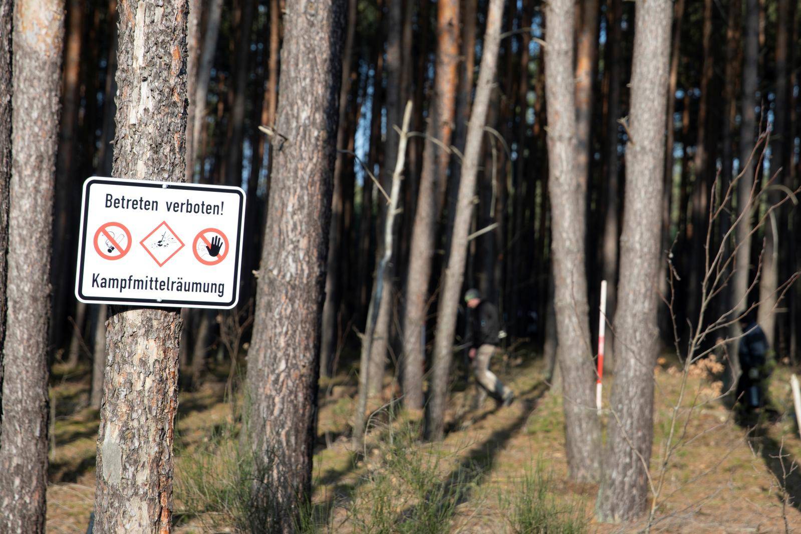 Unexploded ordnance warning signs are seen in the area where the U.S. electric vehicle pioneer Tesla will build its first European factory and design center in Gruenheide near Berlin