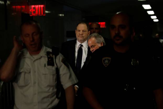 Film producer Harvey Weinstein arrives for his arraignment at Manhattan Criminal Court in New York