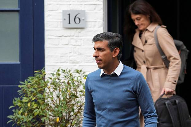 Conservative MP Rishi Sunak leaves his home address in London