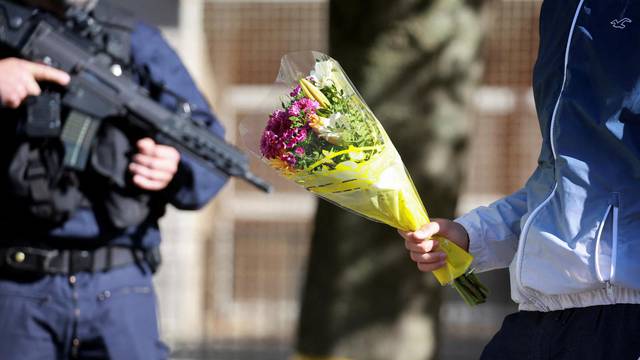 Citizen gathering following a deadly knife attack at school in Arras