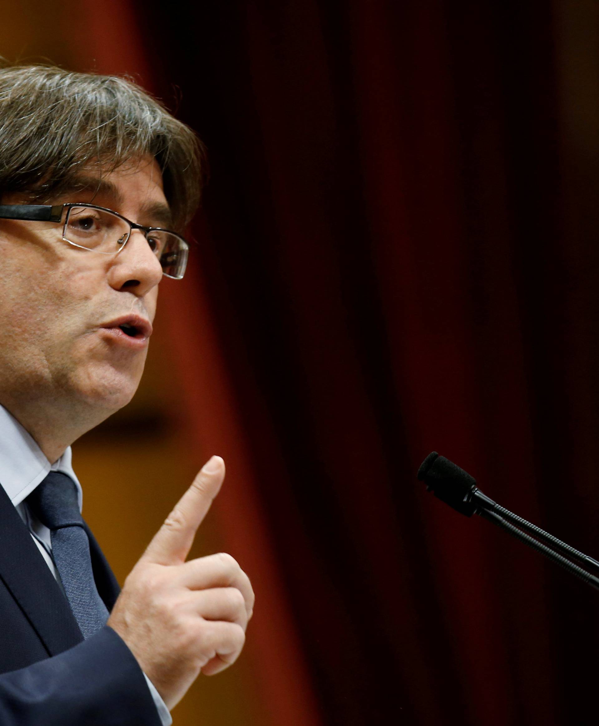 FILE PHOTO - Puigdemont speaks during a confidence vote session at Catalan Parliament in Barcelona