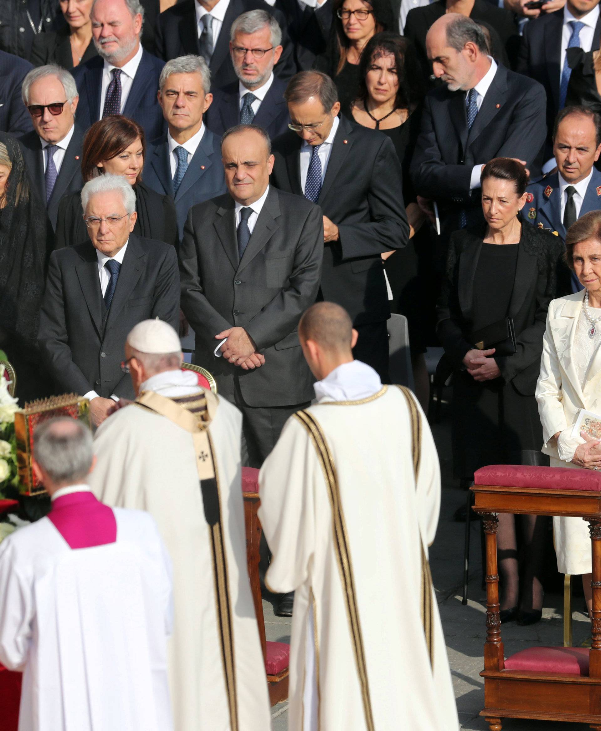 Former Queen Sofia of Spain watches as Pope Francis arrives to lead a Mass for the canonisation of the Pope Paul VI and El Salvador's Archbishop Oscar Romero at the Vatican