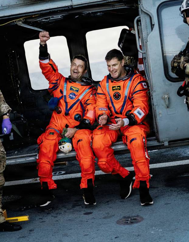 Artemis II crew returns to Earth after Moon flyby mission