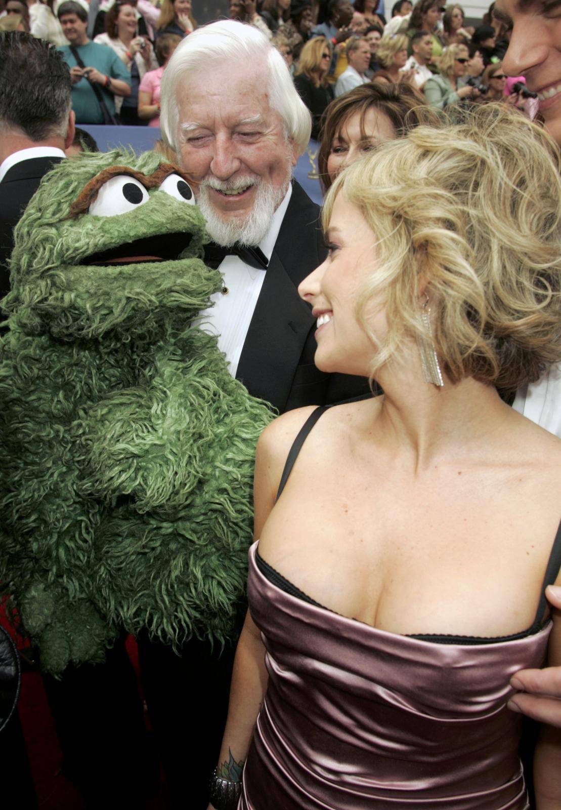 FILE PHOTO: Actress Foley greets Spinney and Oscar the Grouch as they arrive at the 33rd annual Daytime Emmy Awards in Hollywood