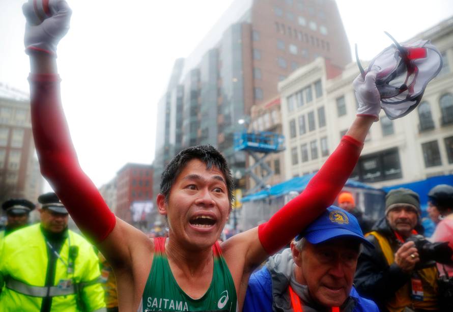 Yuki Kawauchi of Japan celebrates after winning the men's division of the 122nd Boston Marathon in Boston