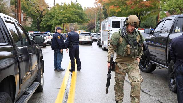 Police officers respond after a gunman opened fire at the Tree of Life synagogue in Pittsburgh Pennsylvania