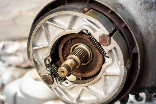 Old,Motorcycle,Drum,Brake,Pad,In,Opened,Engine,Box