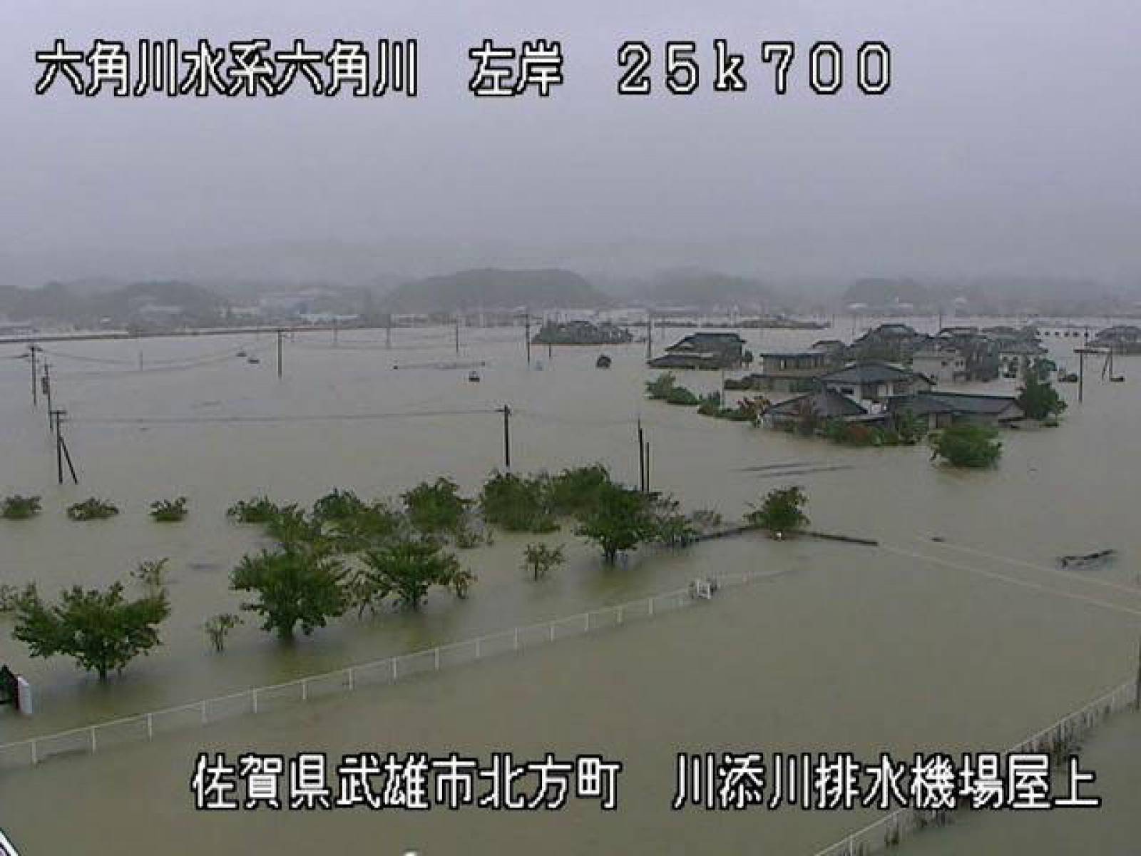 The video grab image shows swollen Rokkaku River in Takeo, Saga prefecture, Japan