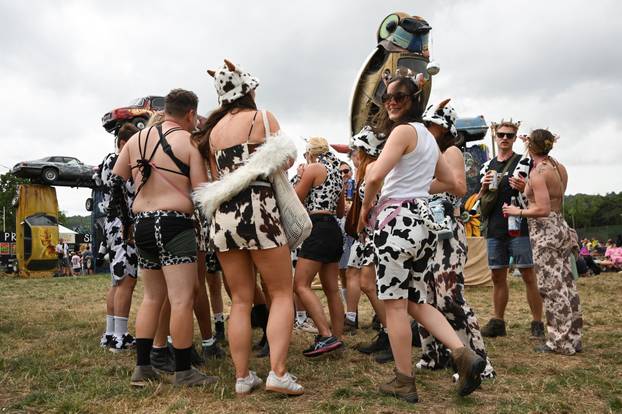 Revellers attend Glastonbury Festival at Worthy Farm in Pilton