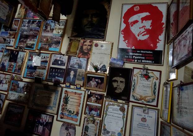 A wall decorated with images of Ernesto "Che" Guevara is seen at the home of a resident in Vallegrande