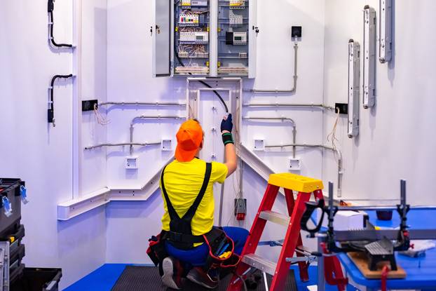 An,Electrician.,Electricity,Installation,In,The,House.,A,Man,Is