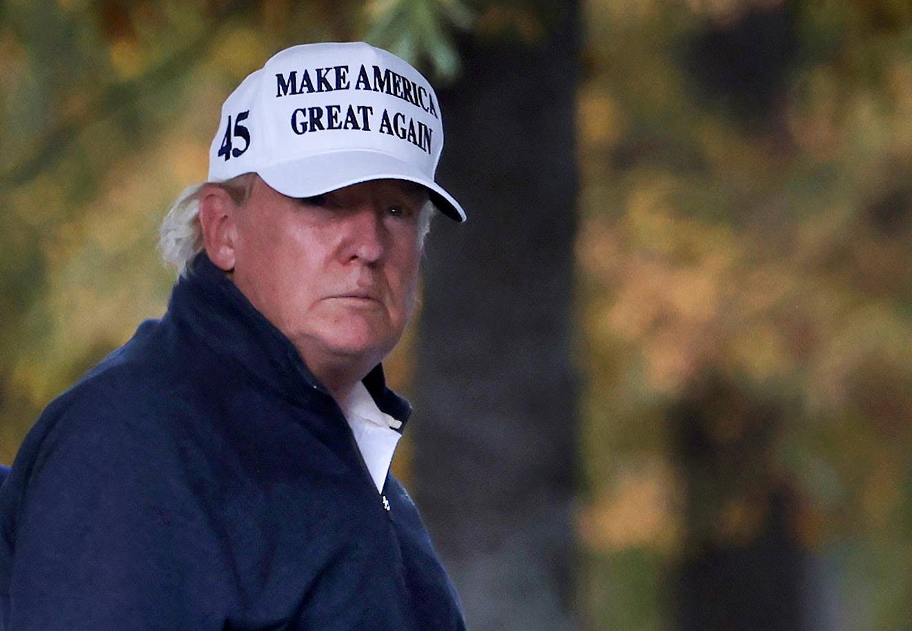 FILE PHOTO: U.S President Donald Trump returns to the White House after news media declared Democratic U.S. presidential nominee Joe Biden to be the winner of the 2020 U.S. presidential election, in Washington