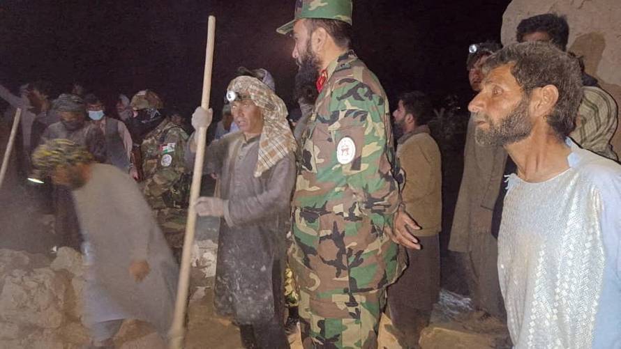 Rescue operations following an earthquake at an unidentified location in Afghanistan