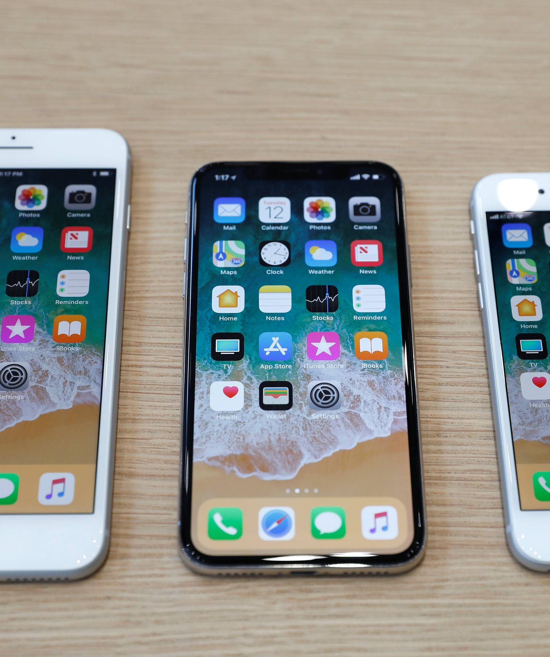 FILE PHOTO: Different iPhone 8 models are displayed during an Apple launch event in Cupertino