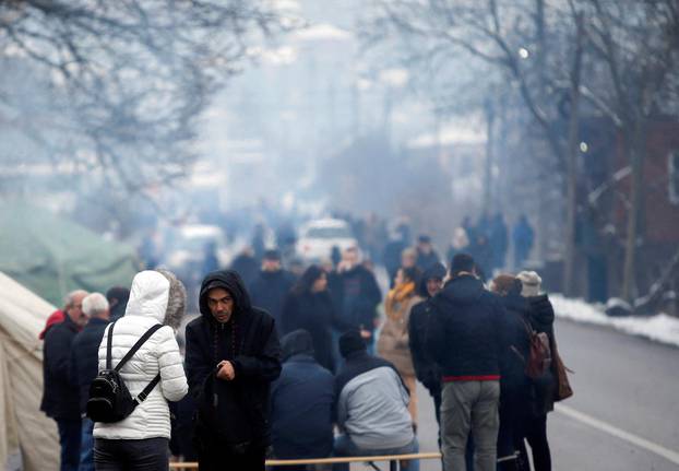 Kosovo Serbs block the road near the village of Rudine