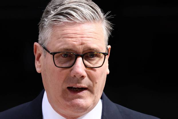 Britain's PM Starmer announces the timeline for his resignation outside 10 Downing Street, in London