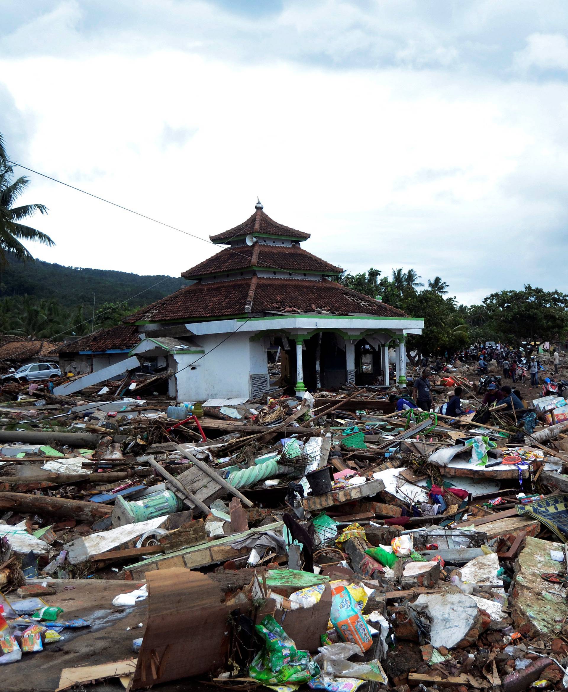 Debris seen after a tsunami hit at Rajabasa district in South Lampung