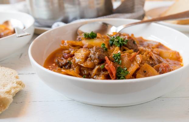 Beef,Stew,With,Cabbage,And,Vegetables.,Served,In,A,Bowl