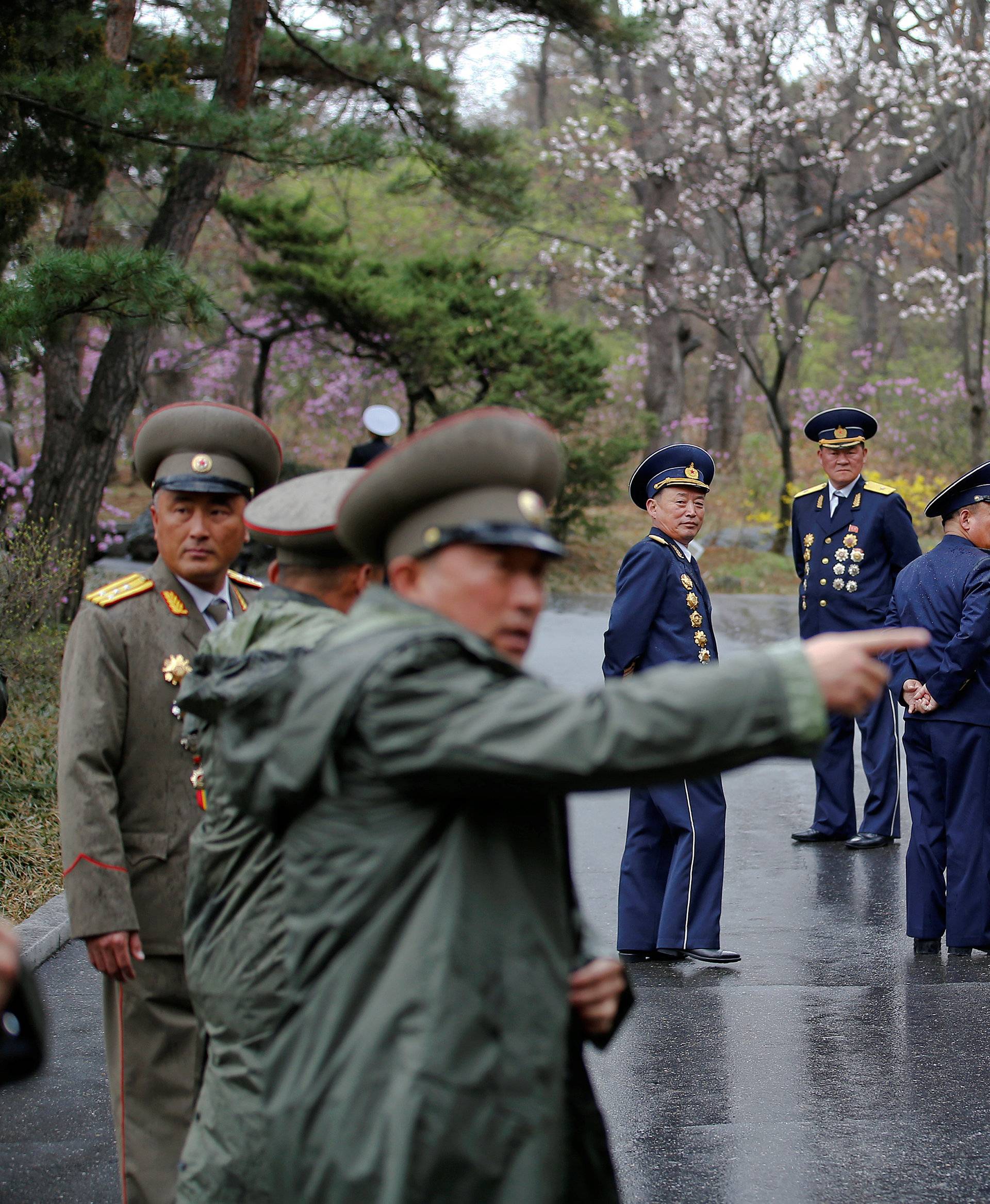 Military officers visit the birthplace of North Korean founder Kim Il Sung, a day before the 105th anniversary of his birth, in Mangyongdae, just outside Pyongyang