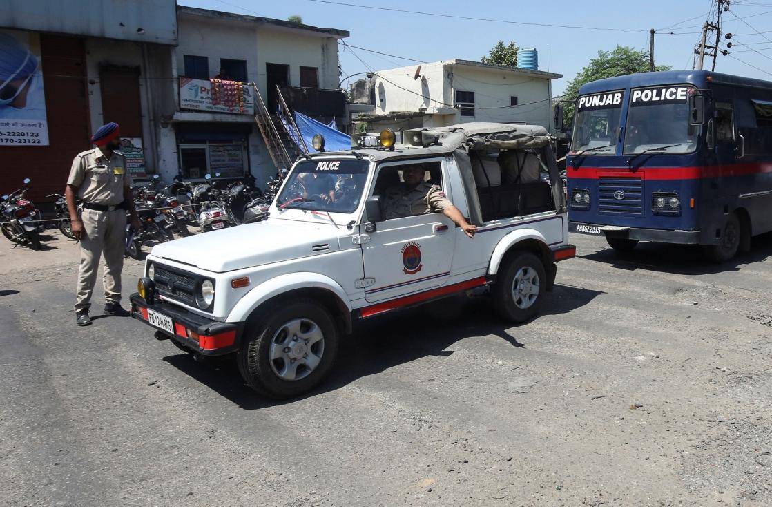 A police bus carrying the men accused of rape and murder of an eight-year-old girl in Kathua, near Jammu, arrives at a court in Pathankot