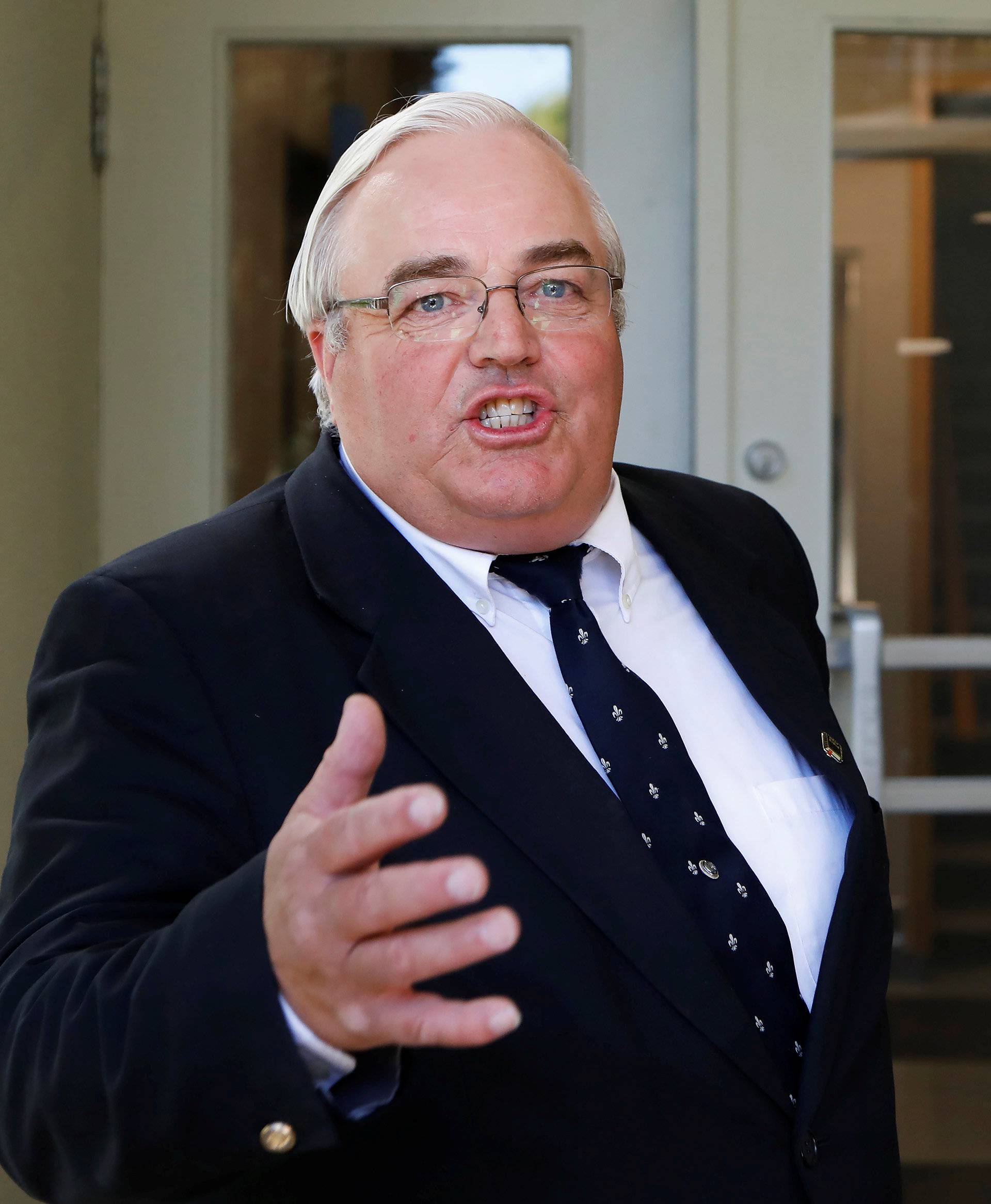Blackmore speaks to reporters after a Canadian court found the former leader of a breakaway religious sect guilty of practicing polygamy, in Cranbrook.
