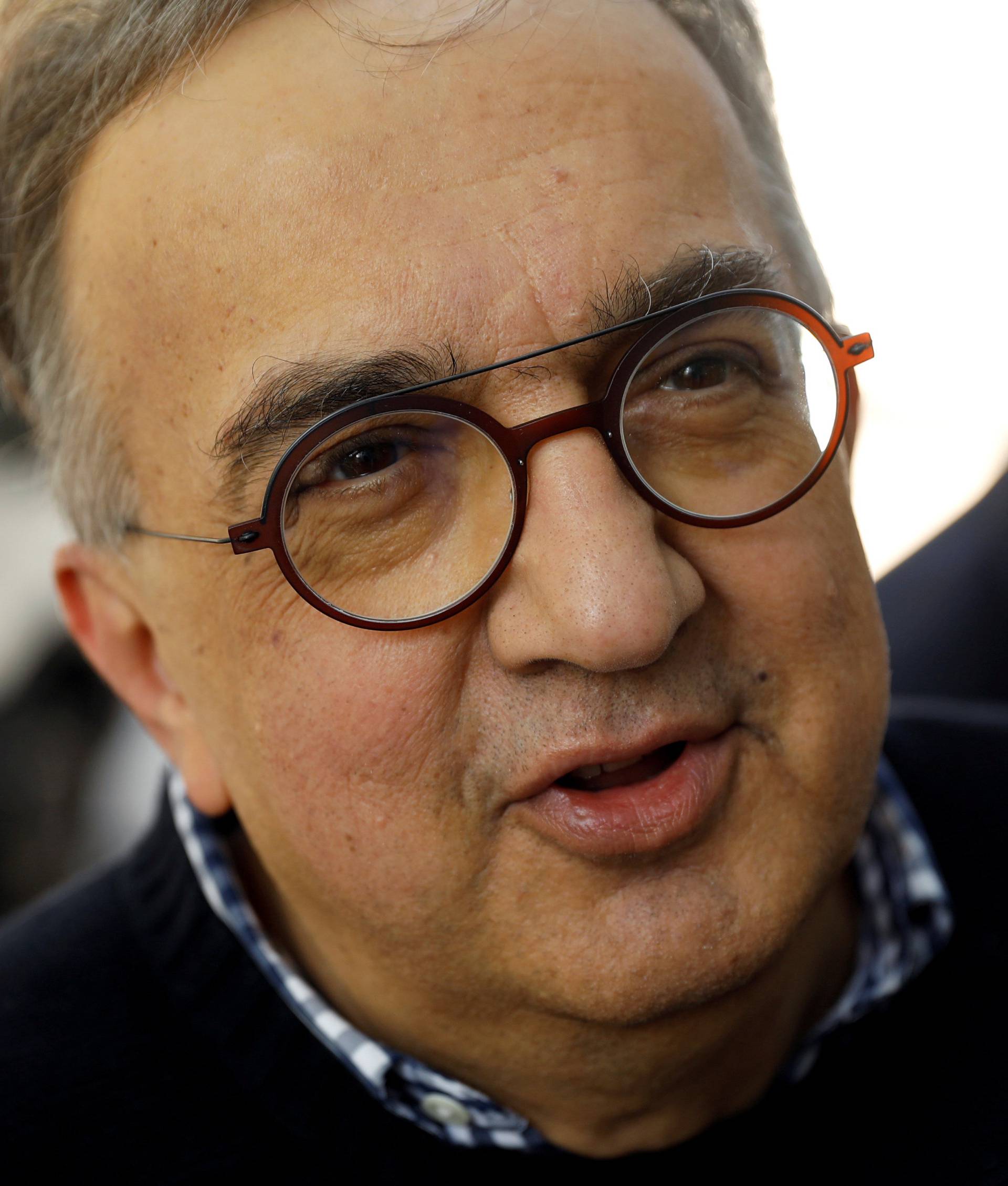 FILE PHOTO: Chairman & CEO of Fiat Chrysler Sergio Marchionne speaks before attending a White House roundtable with senior executives from U.S. and foreign automakers and U.S. President Donald Trump in Washington