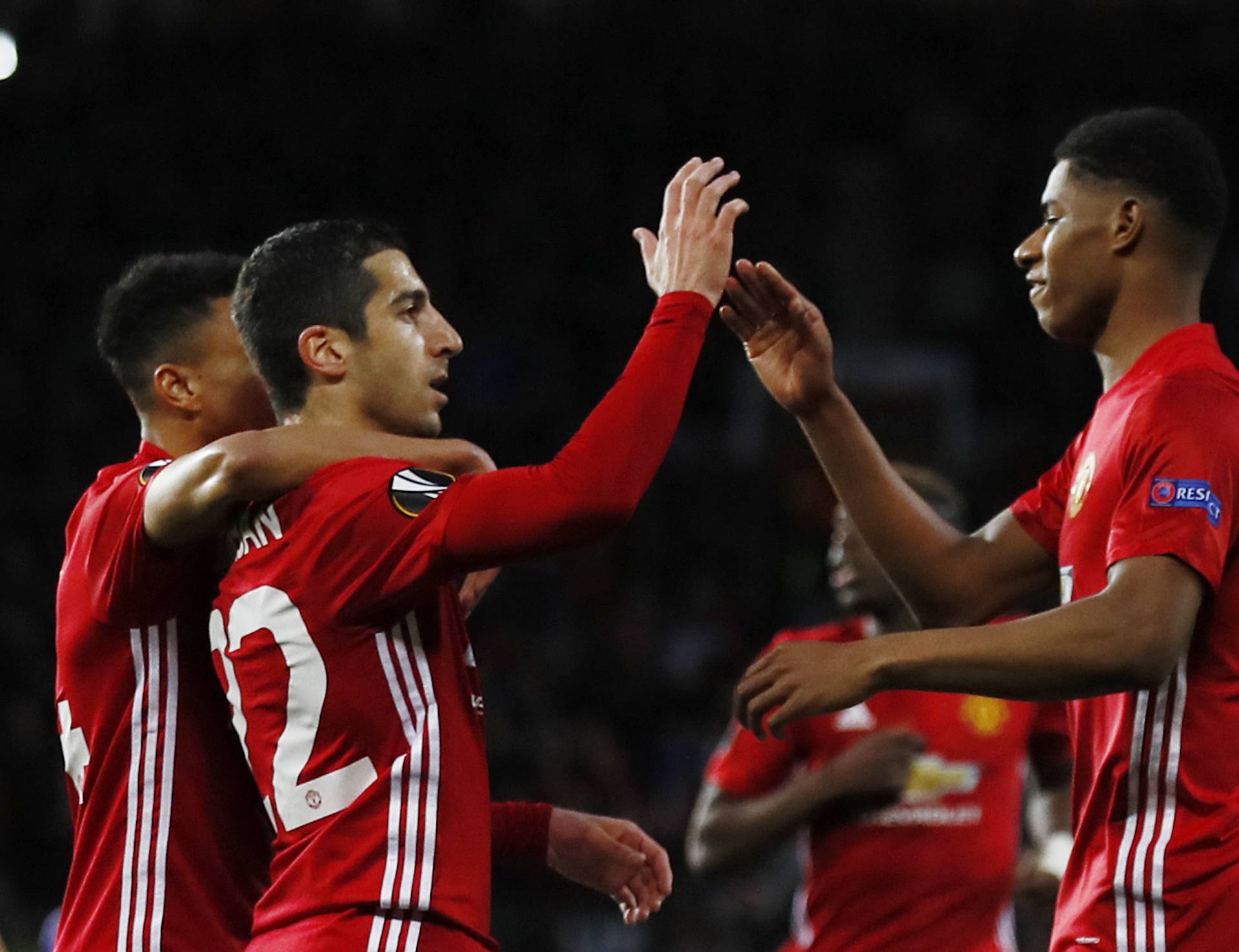 Manchester United's Henrikh Mkhitaryan celebrates scoring their first goal with Marcus Rashford