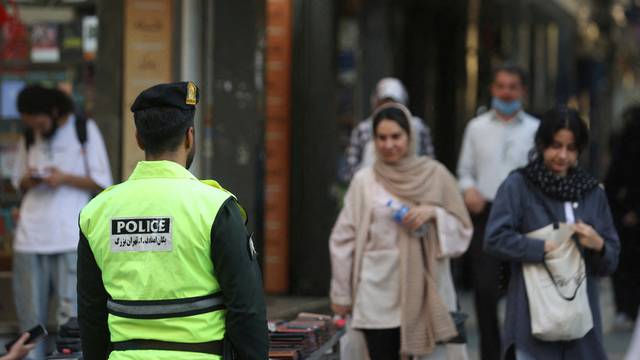 FILE PHOTO: Iranian police force stands on a street during the revival of morality police in Tehran