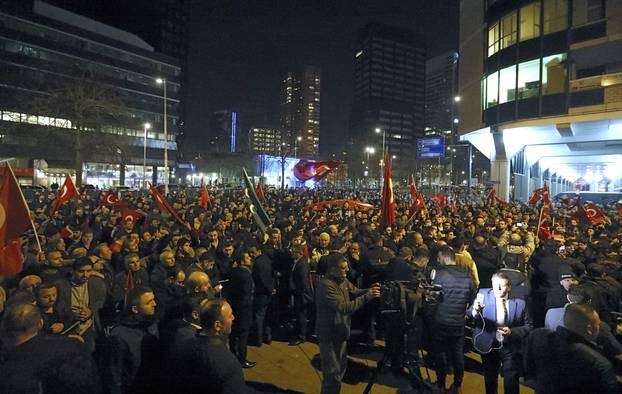 A crowd gathers outside the Turkish consulate in Rotterdam where Turkish minister Kaya is expected