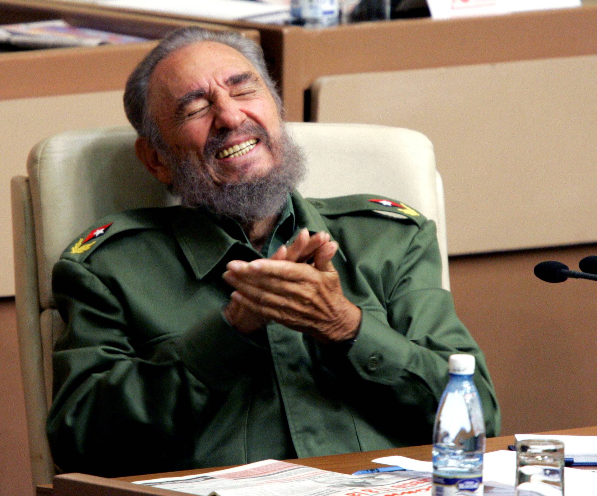 File photo of then Cuban President Fidel Castro laughing during the year-end session of the Cuban parliament in Havana