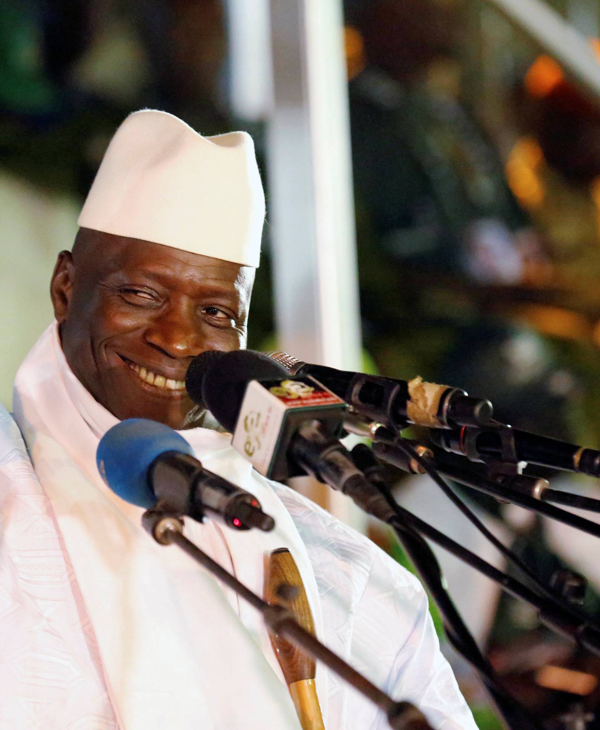 FILE PHOTO - Gambia's President Jammeh smiles during a rally in Banjul