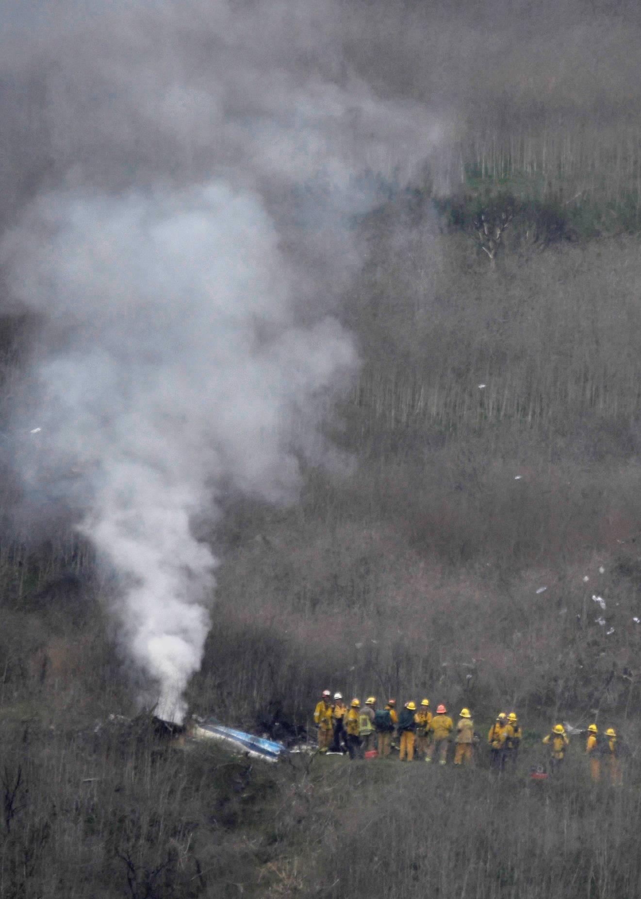 LA county firefighters on the scene of a helicopter crash that reportedly killed Kobe Bryant in Calabasas