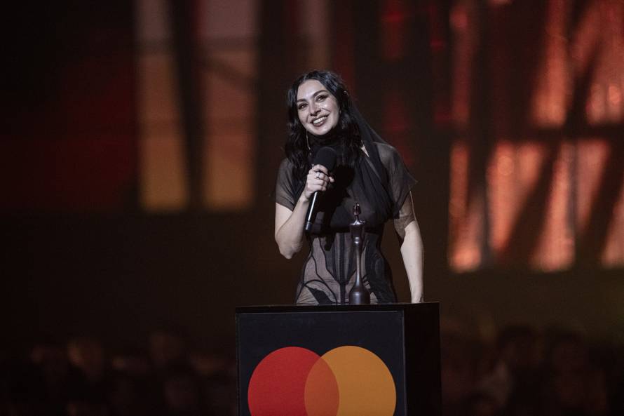 Charli xcx being presented the BRIT Award for Album Of The Year for BRAT at the 2025 BRIT Awards at The O2 Arena, London on 1 March 2025