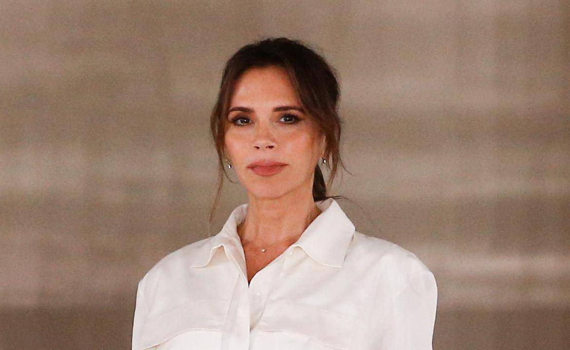 Designer Victoria Beckham at the end of her catwalk show during London Fashion Week in London