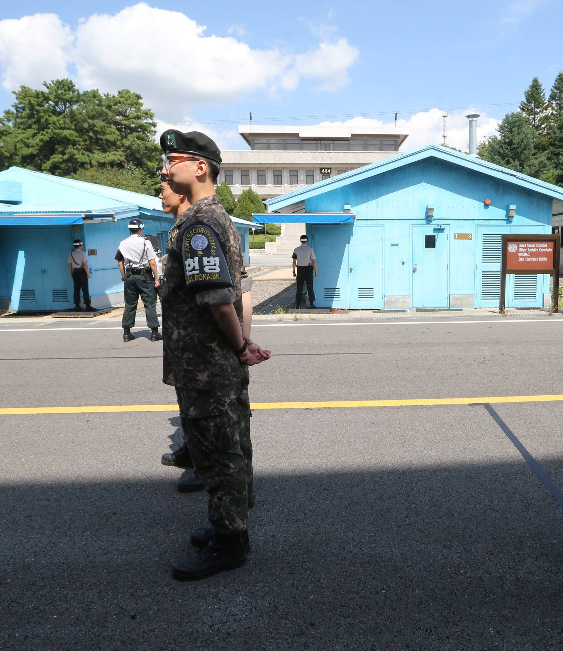 South Korean army soldiers stand guard at the border village of Panmunjom in the Demilitarized Zone