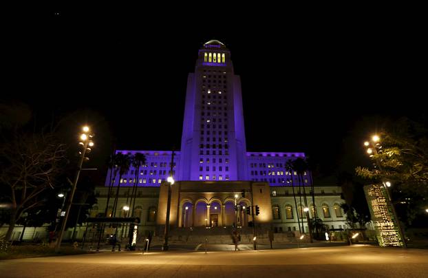 City Hall is illuminated in purple in remembrance of the late singer Prince in Downtown Los Angeles