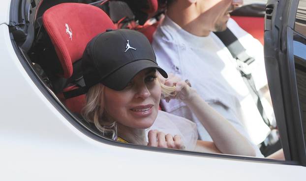 Milan, Zlatan Ibrahimovic with his wife Helena and their white Ferrari