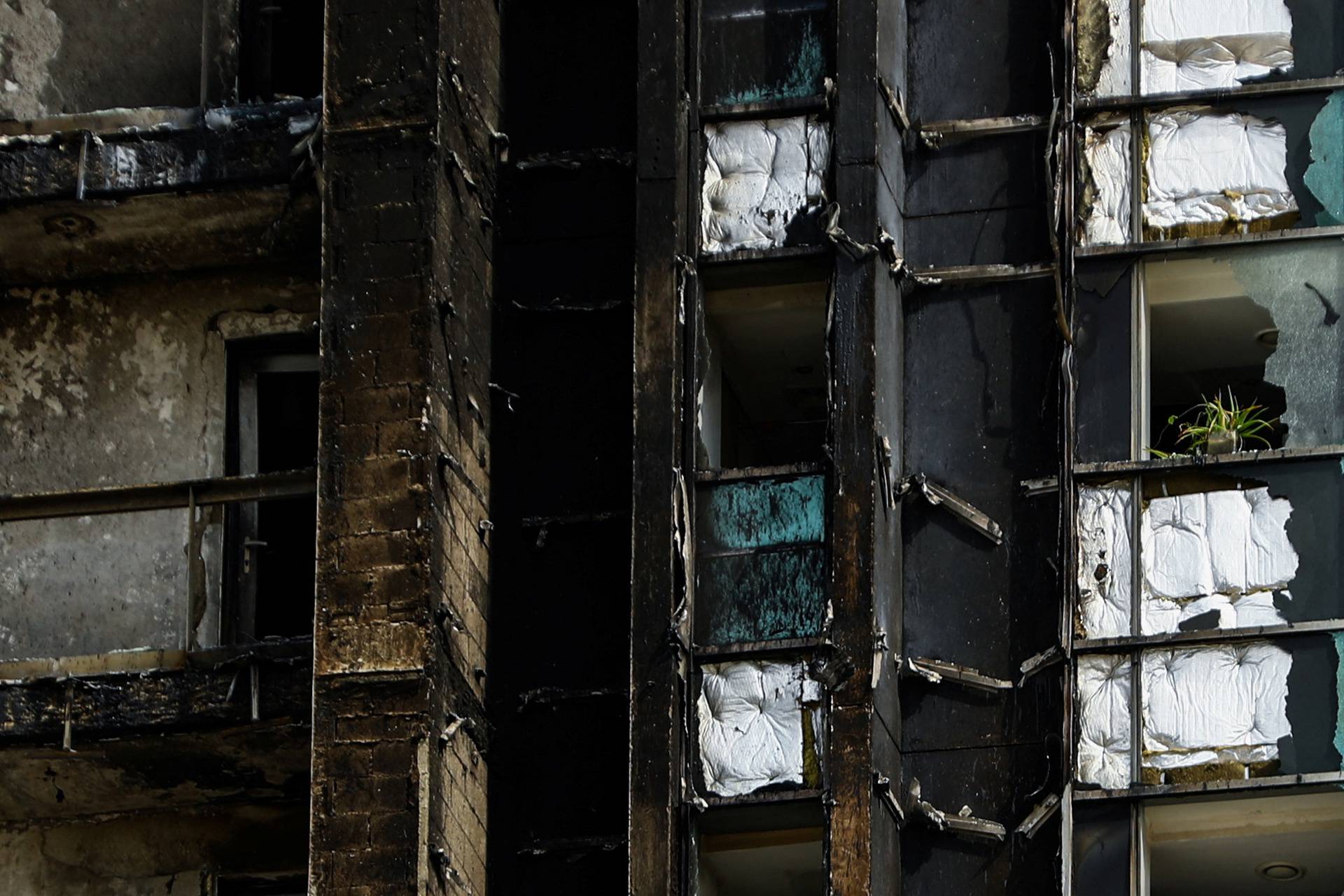 Fire damage is visible on the 8 Boulevard Walk high-rise building located near Burj Khalifa in Dubai