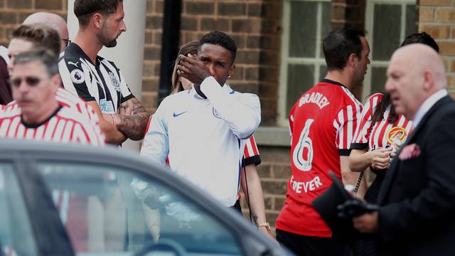 Footballer Jermain Defoe reacts ahead of the funeral of Bradley Lowery